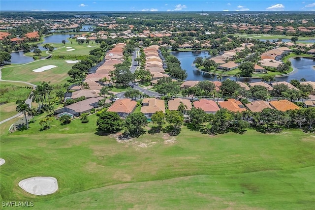 bird's eye view with a residential view, golf course view, and a water view