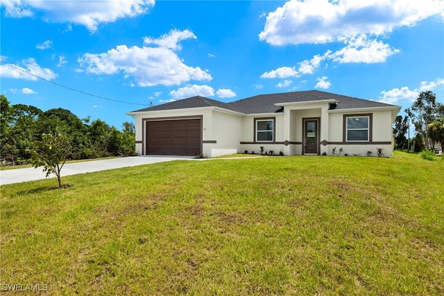 view of front facade featuring a garage and a front lawn