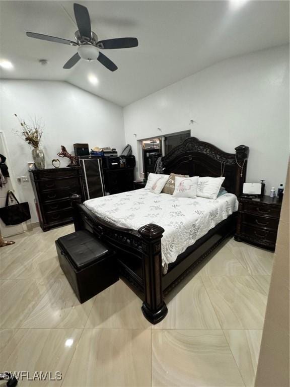 bedroom featuring lofted ceiling and ceiling fan