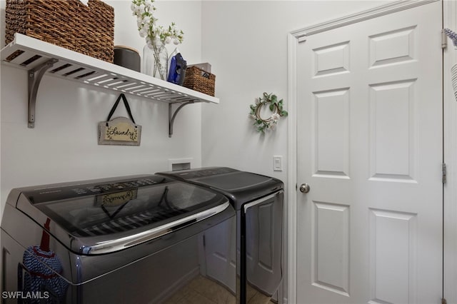 laundry area featuring laundry area and washing machine and dryer