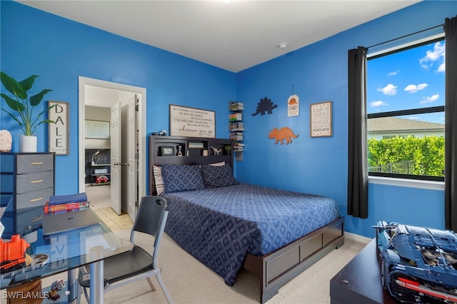 carpeted bedroom with baseboards