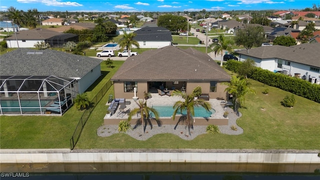 drone / aerial view with a residential view