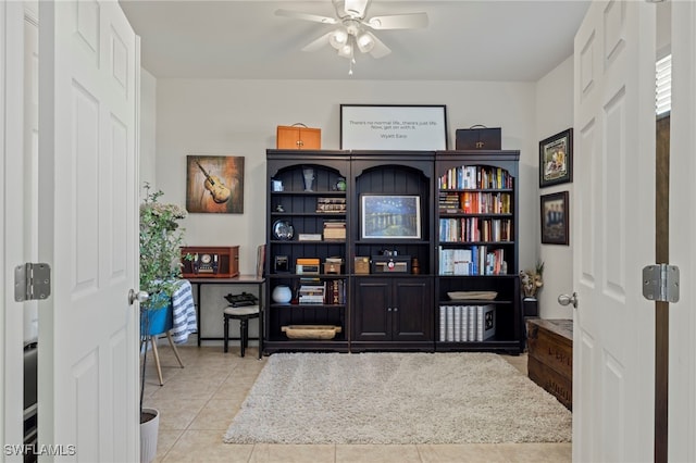 office space featuring ceiling fan and tile patterned floors