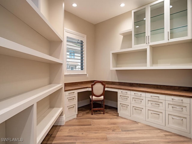 2835 Silverleaf Ln, Naples, FL 34105 - unfurnished office featuring built in study area, recessed lighting, and light wood-style flooring