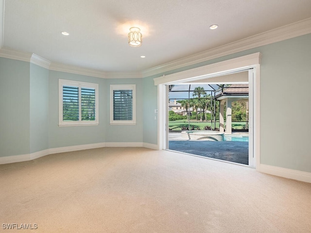 2835 Silverleaf Ln, Naples, FL 34105 - carpeted empty room featuring crown molding, a sunroom, and recessed lighting