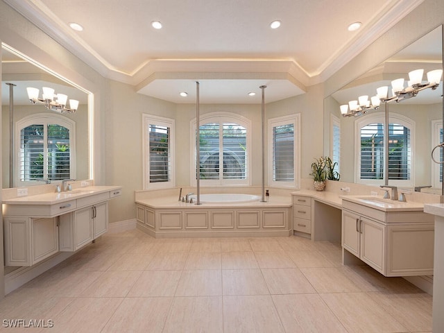 2835 Silverleaf Ln, Naples, FL 34105 - bathroom featuring a chandelier, a garden tub, two vanities, crown molding, and recessed lighting