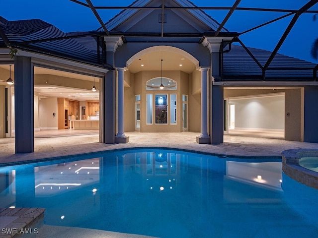2835 Silverleaf Ln, Naples, FL 34105 - view of pool featuring a patio, a pool with connected hot tub, and a lanai