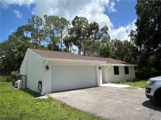 ranch-style house featuring a garage