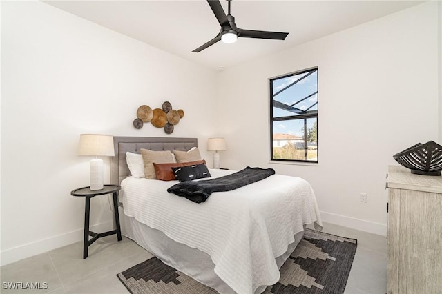 bedroom featuring ceiling fan and light tile patterned floors