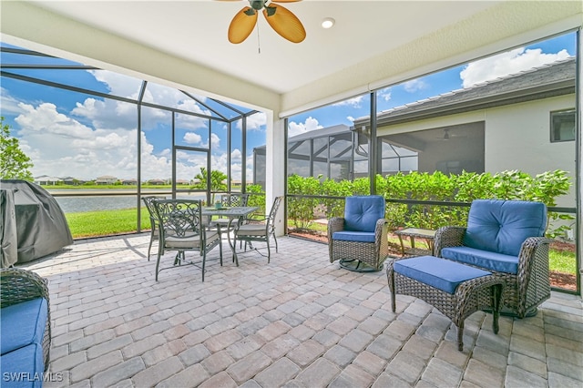 sunroom / solarium with ceiling fan