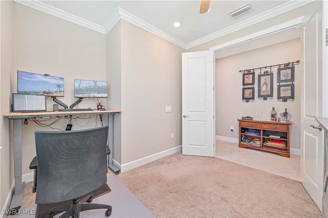 carpeted home office with ceiling fan and ornamental molding