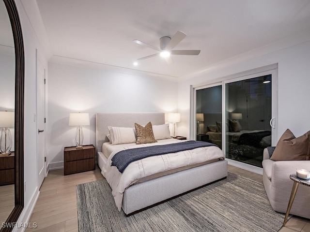 bedroom with ceiling fan and light wood-type flooring