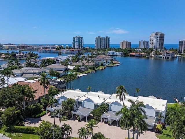 birds eye view of property featuring a water view