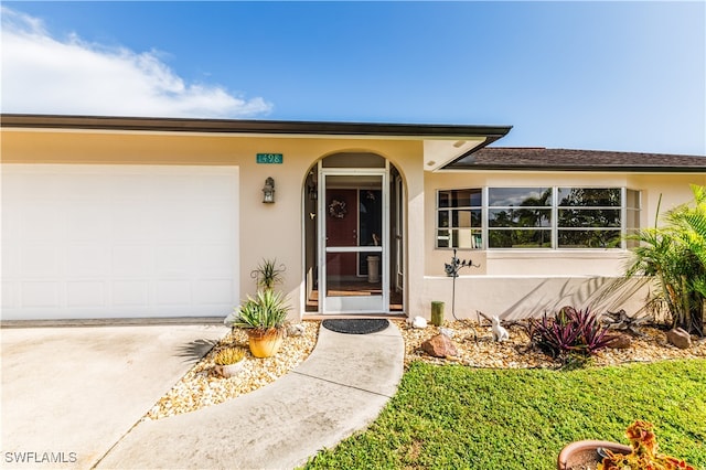 property entrance featuring a garage