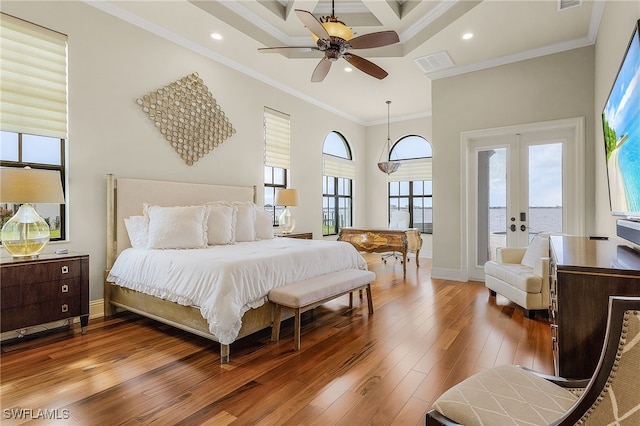 bedroom featuring wood-type flooring, access to exterior, coffered ceiling, ornamental molding, and ceiling fan