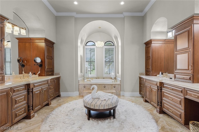 614 Coral Dr, Cape Coral, FL 33904 - full bathroom featuring crown molding, two vanities, and a garden tub