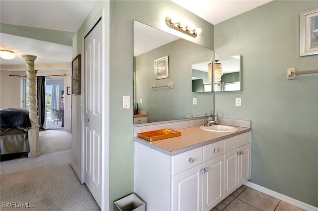 bathroom featuring tile patterned floors and vanity