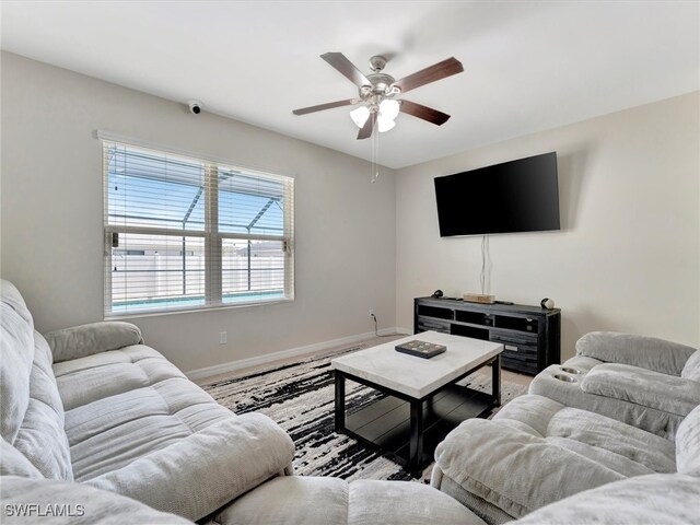 living room with ceiling fan