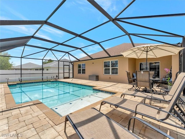 view of pool featuring a lanai and a patio area