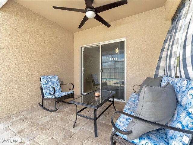 view of patio with ceiling fan