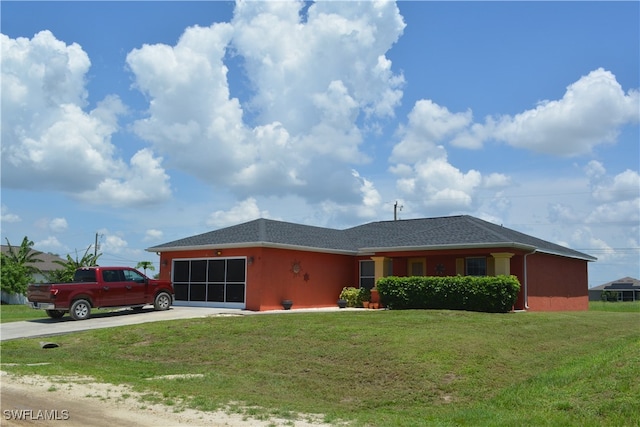 single story home featuring a front yard