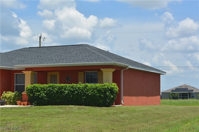 exterior space with a lawn