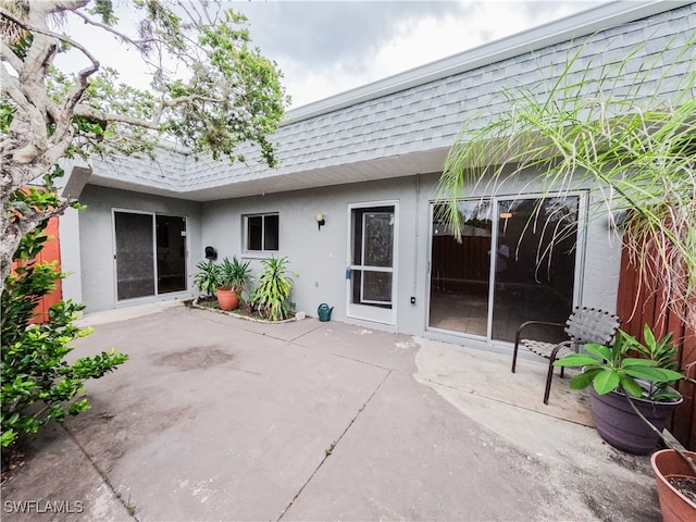 rear view of house with a patio area