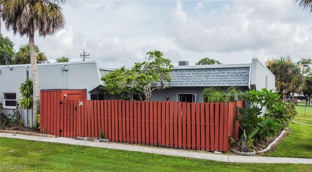 exterior space featuring a front lawn