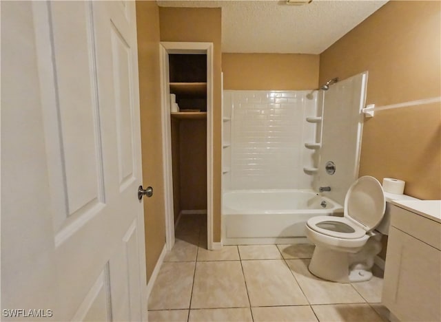 full bathroom with tile patterned floors, a textured ceiling, shower / bathtub combination, and toilet