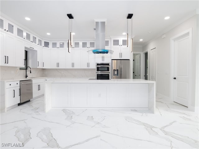 kitchen featuring pendant lighting, a center island, white cabinetry, island exhaust hood, and stainless steel appliances