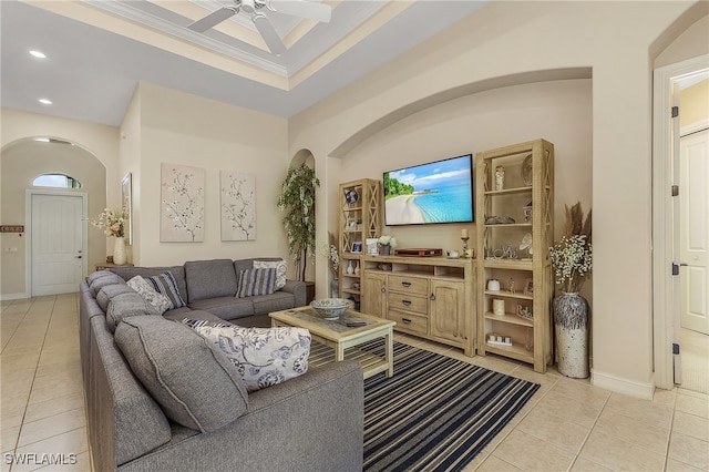 living room featuring ceiling fan and light tile patterned flooring