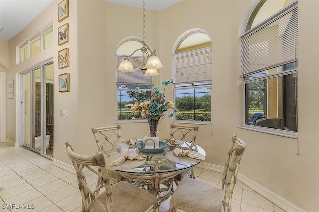 tiled dining room with a high ceiling