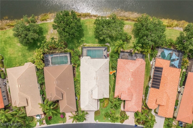 bird's eye view with a water view