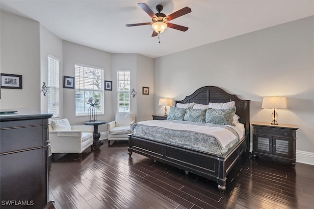 bedroom featuring hardwood / wood-style floors and ceiling fan