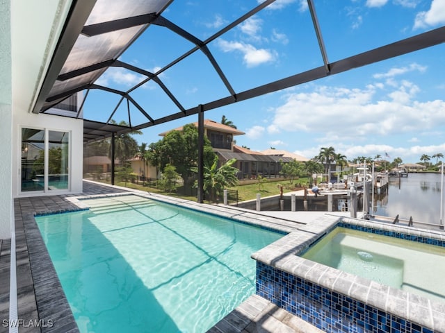 view of pool featuring an in ground hot tub, a dock, and a lanai