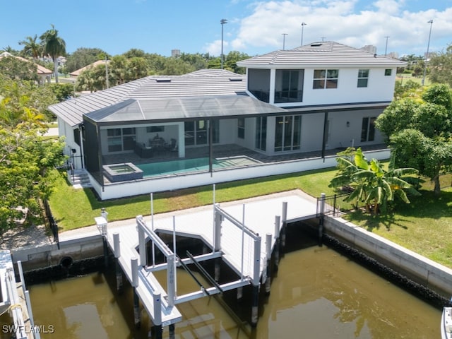 dock area featuring a patio and a lawn