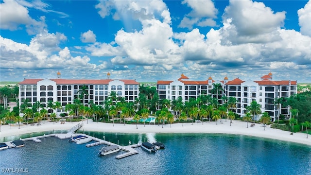 view of swimming pool with a water view