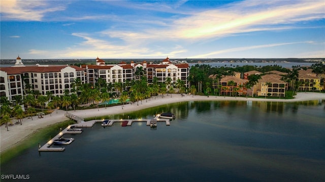 aerial view at dusk with a water view