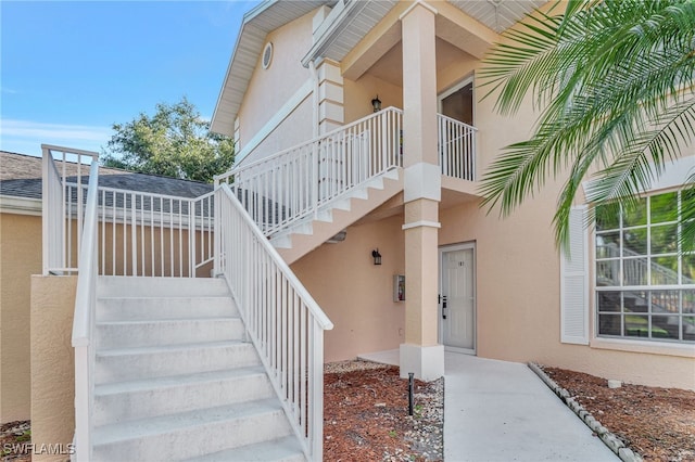 737 Wiggins Lake Dr Unit 201, Naples, FL 34110 - entrance to property featuring stucco siding