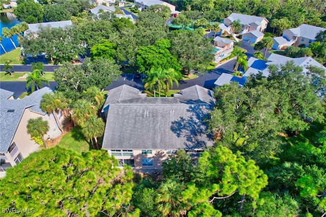 737 Wiggins Lake Dr Unit 201, Naples, FL 34110 - aerial view of residential area with a tree filled landscape