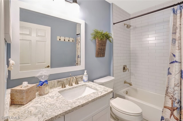 full bathroom with vanity, toilet, and shower / tub combo