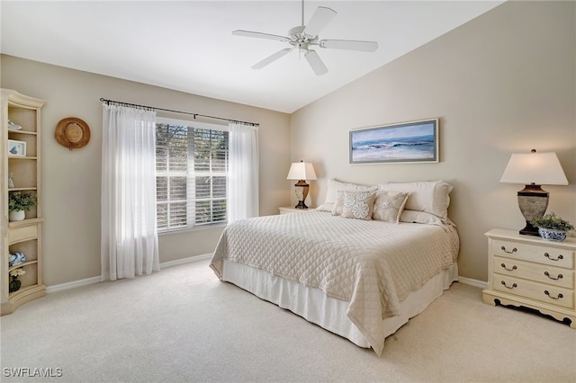 carpeted bedroom featuring ceiling fan and lofted ceiling