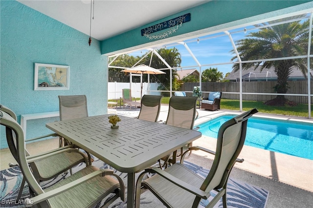 view of pool featuring a patio and a lanai