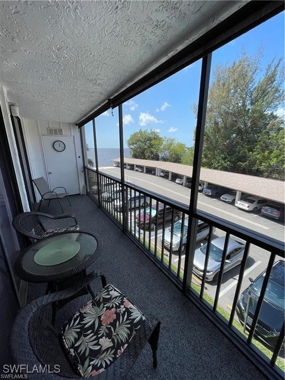 balcony featuring visible vents