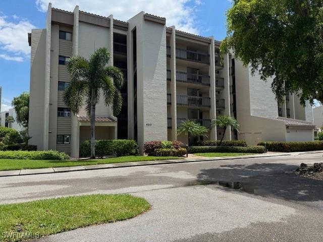4210 Steamboat Bnd Unit 405, Fort Myers, FL 33919 - view of apartment building / complex