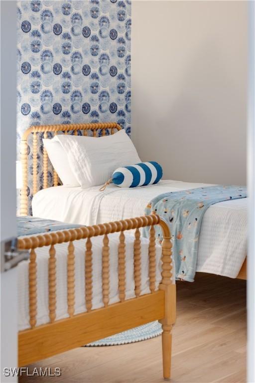 bedroom featuring wood-type flooring