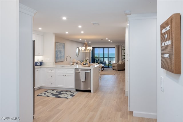 kitchen featuring light wood-type flooring, white cabinets, and stainless steel dishwasher