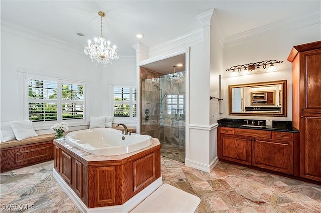 bathroom with crown molding, independent shower and bath, a notable chandelier, and vanity