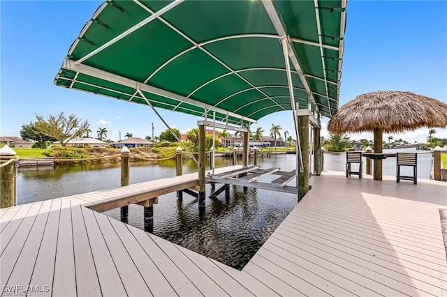 view of dock with a water view