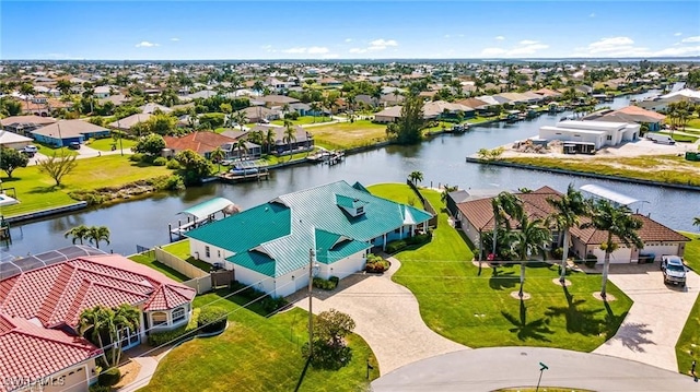 bird's eye view with a water view